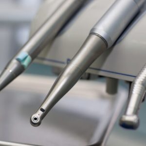 Group of dental tools and equipment for the treatment of teeth.