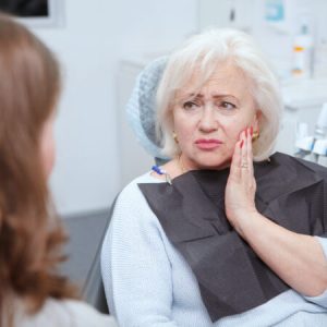 Senior woman at dental clinic